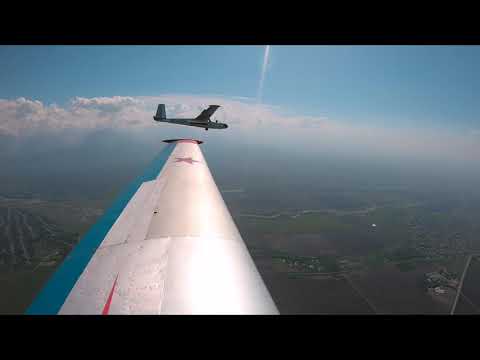 Во Владикавказском авиационно-спортивном клубе ДОСААФ России впервые   совершен синхронный прыжок с парашютом с двух планеров с высоты 1800 метров
